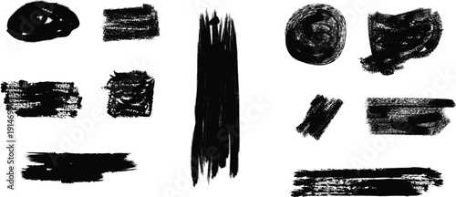 A collection of abstract black brush strokes on a white background