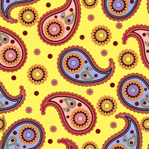 Colorful paisley seamless pattern with ornamental floral details on bright yellow background. Decorative ethnic style design ideal for textiles, wallpaper, wrapping paper, and fashion prints.
