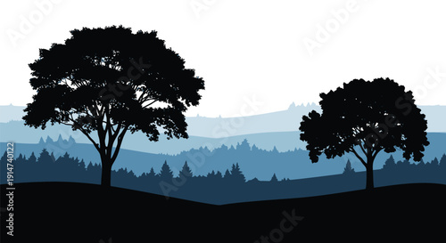 Silhouetted trees against a layered blue and gray landscape