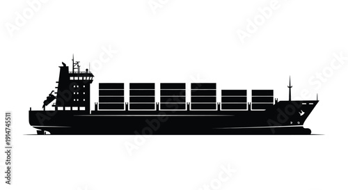 A stark silhouette of a large container ship at sea