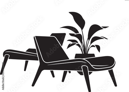 Black and white of lounge chair and ottoman with plant