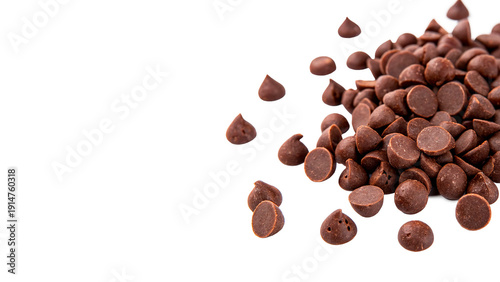 Chocolate chips are scattered on a transparent background.