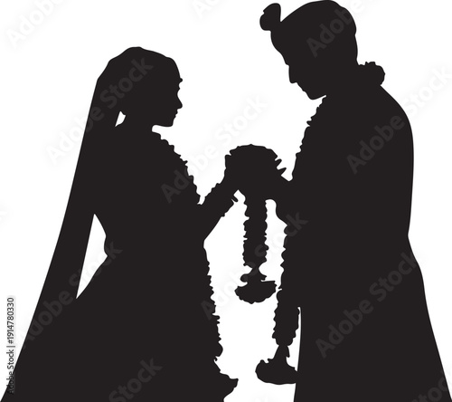 Silhouette of couple tying wedding garland traditional