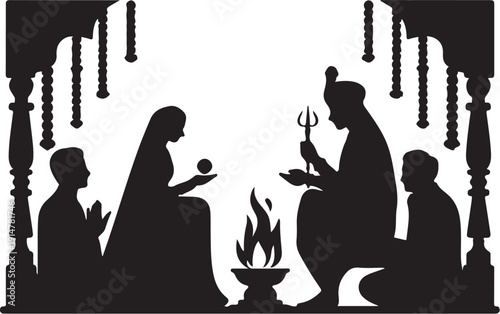 Silhouette of people performing religious ritual with fire and offerings