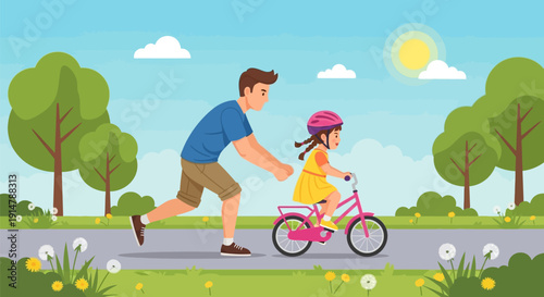Father teaching young daughter to ride a bicycle in a park.