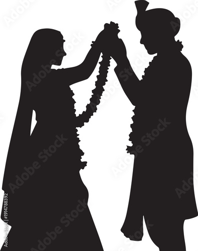 Silhouette of two people exchanging flower garlands