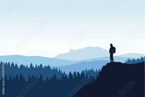 A lone silhouette stands atop a peak overlooking layered mountain ranges high quality