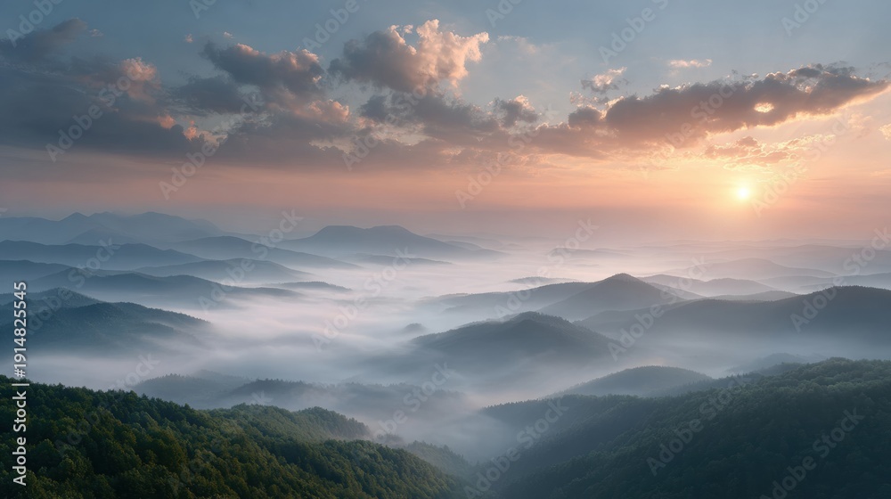 Fototapeta premium Landscape background with sunrise over misty mountain