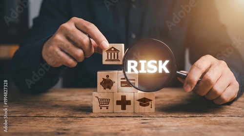 Wallpaper Mural Financial risk management concept showing hands stacking wooden blocks with banking icons and magnifying glass highlighting the word RISK. Torontodigital.ca