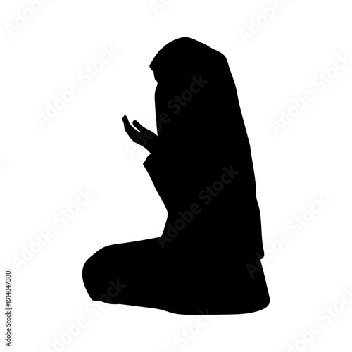 Praying muslim woman silhouette