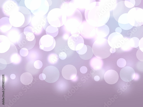 光の玉がキラキラと輝く抽象的な紫色の背景