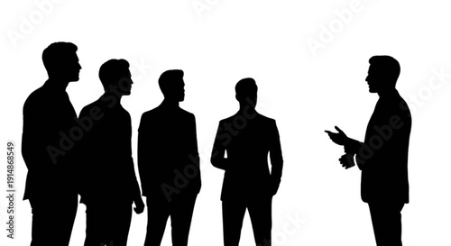 Silhouettes of a group of people listening to a man speaking