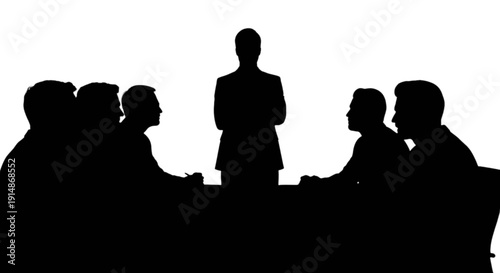 Silhouette of a business meeting with a presenter and attendees
