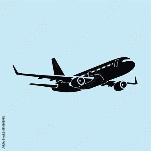 Black silhouette of a passenger jet airplane flying