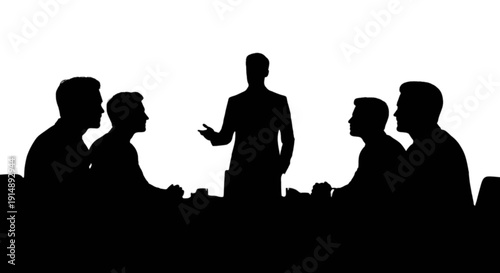 Silhouettes of a group of people in a meeting or presentation setting