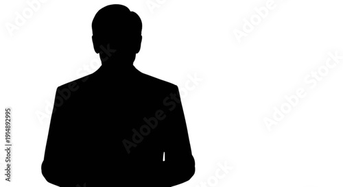 Silhouette of a person in a suit standing confidently against a white background