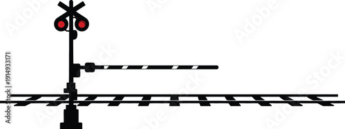 Red railroad crossing signal with lowered arms a stark black silhouette
