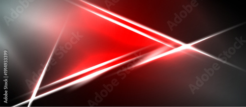 Abstract red lines intersect black background. Bright glow creates dynamic visual effect. Modern design element.