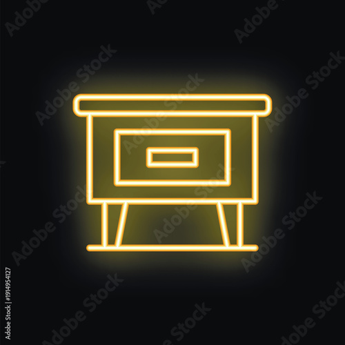 Glowing yellow neon sign depicting a nightstand with one drawer, suitable for use in designs related to furniture, interior design, or as a decorative element