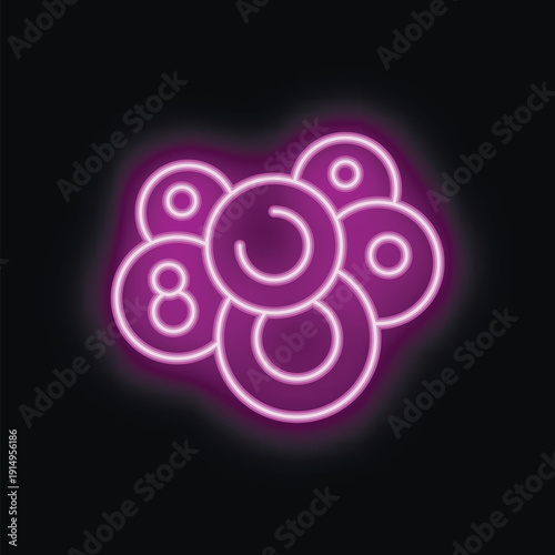 Purple neon sign representing billiard balls on a wall at night, shining brightly with a vibrant glow