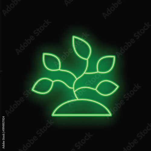 Green neon sign showing growing plant with leaves on black background