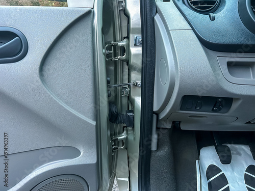 Canvas-taulu Car door interior shows latch mechanism with detailed view of the door handle, p