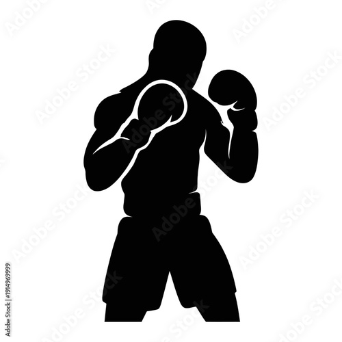 A boxer stands confidently in the darkness with a bold boxing stance