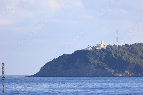 Lighthouse Cap Malabata.  The Lighthouse at Cap Malabata is a square-towered lighthouse built in 1919.  It is situated on a cliff at the eastern end of Tangier Bay, Morocco.