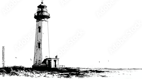A tall, white beacon of maritime safety against a bright sky, next to a rocky shoreline