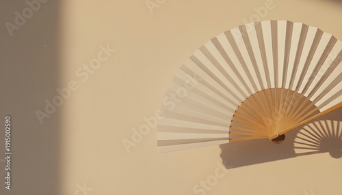 Dramatic Blank White Hand Fan Fully Opened with Soft Shadow on Warm Off-White Wall Golden Hour Side Lighting Elegant Mood Mockup