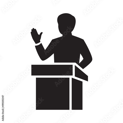 Silhouette of a Person Speaking at a Podium Presentation