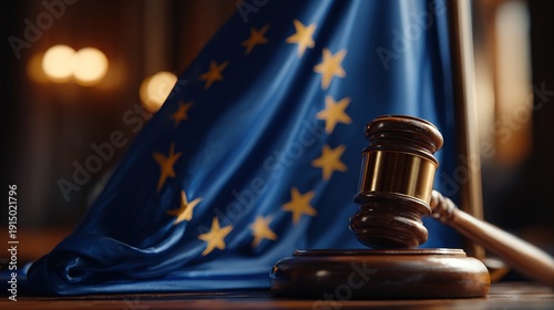 European Union Flag Gently Waving Behind Classic Gavel in Warm Courtroom Setting Capture of Justice and Unity Symbolizing Legal Authority and Governance