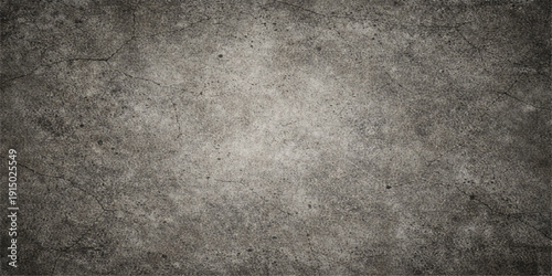 Old dark gray grunge concrete wall with a rough textured stone surface and aged vintage metal material backdrop