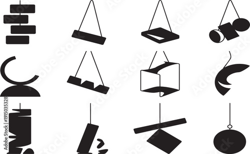 Collection of abstract black shapes suspended by thin lines on white background