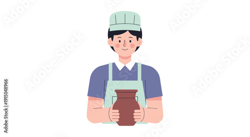 Young male chef holding a ceramic pot in professional kitchen