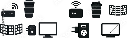 A digital workspace showcases essential items like a wireless router, reusable coffee cup, folding screen, power outlet, and monitor, reflecting a contemporary environment ideal for productivity.