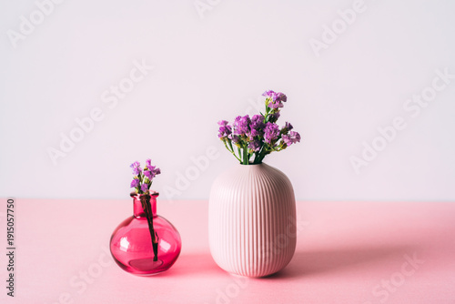 Minimalist floral arrangement with vases