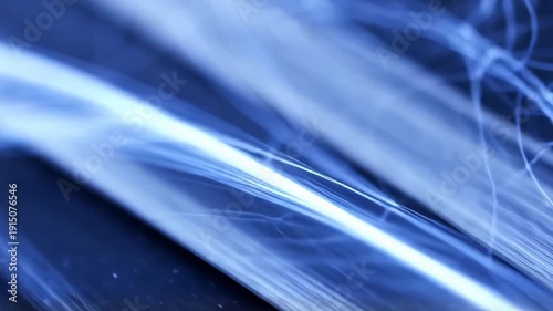 Cool blue smoke wisps drift diagonally with gentle swirling turbulence against a soft gradient, macro focus, slow lateral camera slide, calm atmospheric