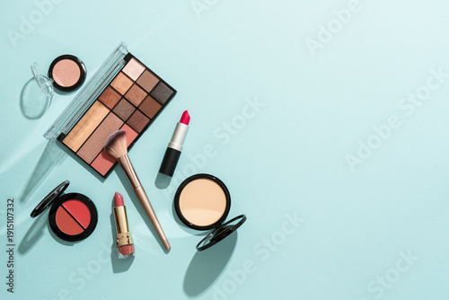 Make up products on blue ba...