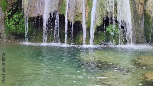 Water flowing from a waterfall. Water fall background 