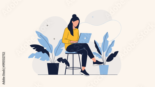 Young woman in a yellow sweater sits on a high stool using a laptop surrounded by large potted plants in a stylish modern workspace.