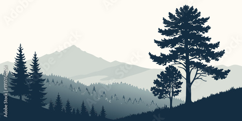 Silhouettes of tall trees against a mountain range during sunset.