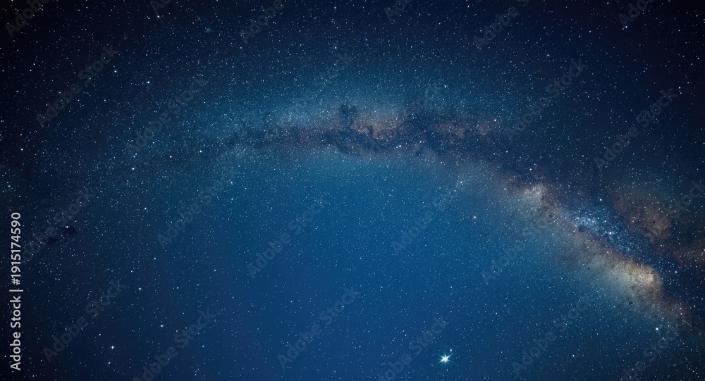 Fototapeta premium Starry expanse with the Milky Way arching across a clear night sky