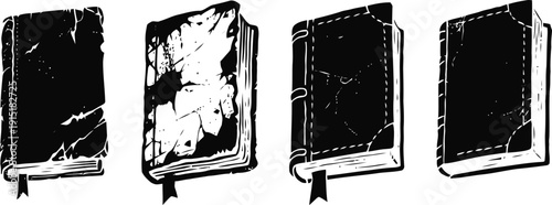 Four worn old books with cracked covers and bent pages in black and white