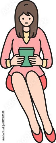 A female office worker sitting and looking at her phone