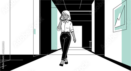 Businesswoman walking down a modern office hallway while talking on her mobile phone
