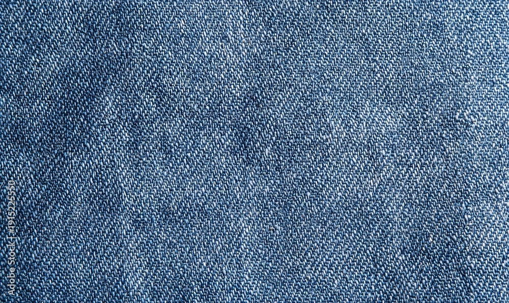 Naklejka premium A blue denim fabric with a pattern