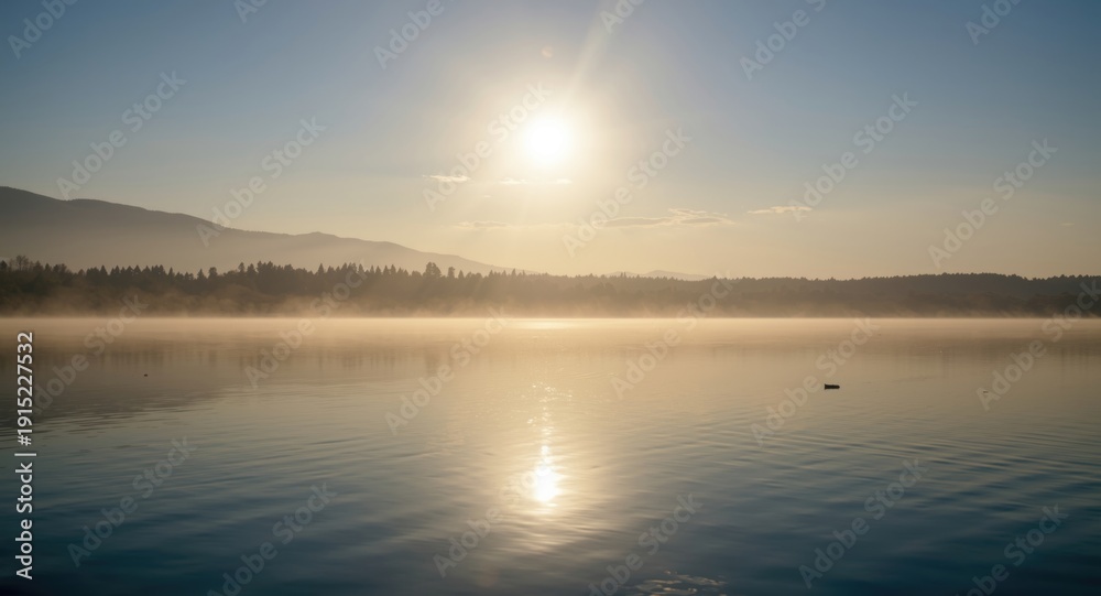 Fototapeta premium Peaceful morning light bathing a vast lake with gentle water reflections