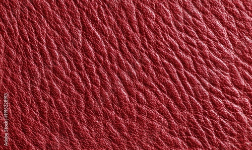 Straight-on texture of pomegranate skin surface, leathery matte red texture