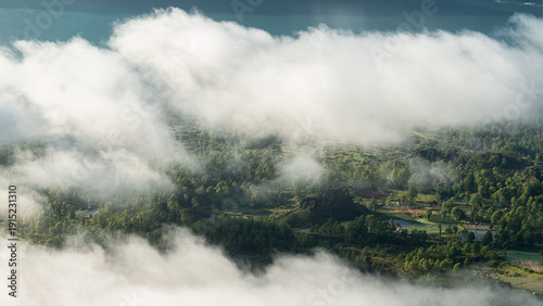 Lake Batur on Bali in clouds, Indonesia, panoramic view